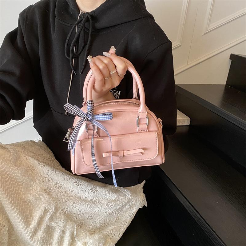 New women's bags trendy and versatile solid color small shell bags portable shoulder oblique span bags