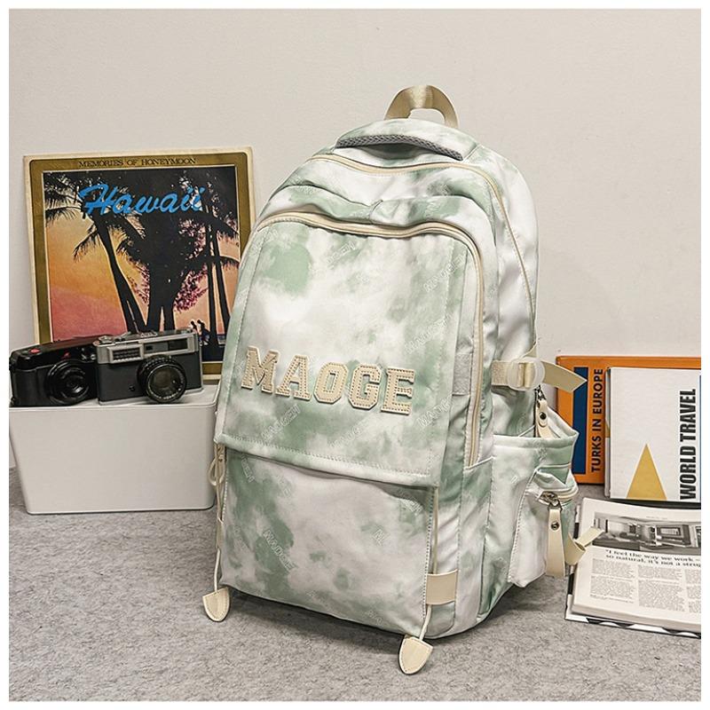 Der neue Schulranzen ist hochwertig, frisch und süß, ein Rucksack mit literarischem Graffiti-Tie-Dye und ein leichter Rucksack für Junior- und Oberstufenschüler.