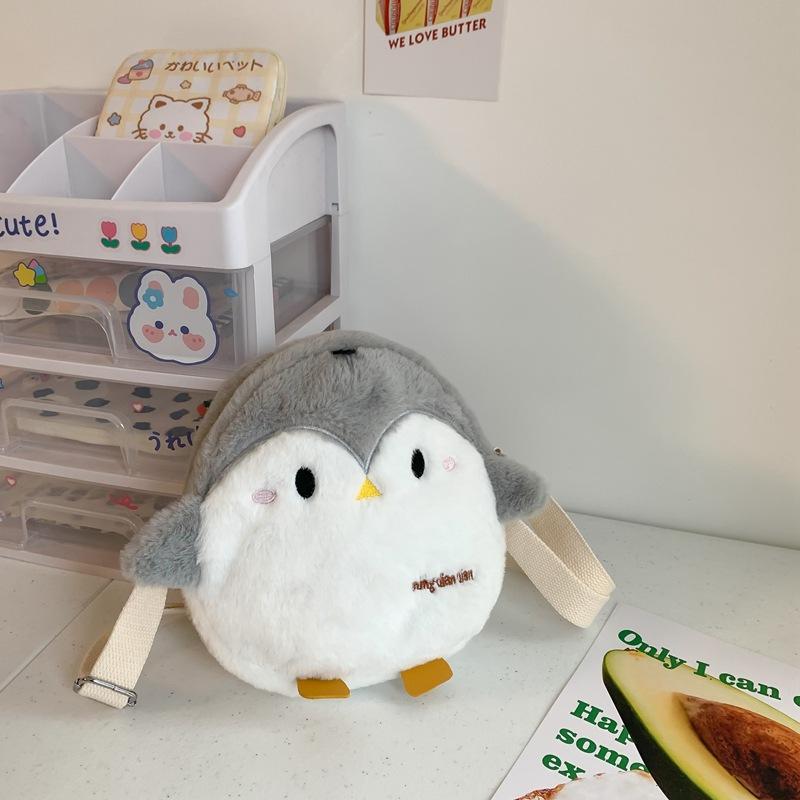 

Hairy cute little penguin girl shoulder oblique span bag new cute cartoon student going out mobile phone storage bag