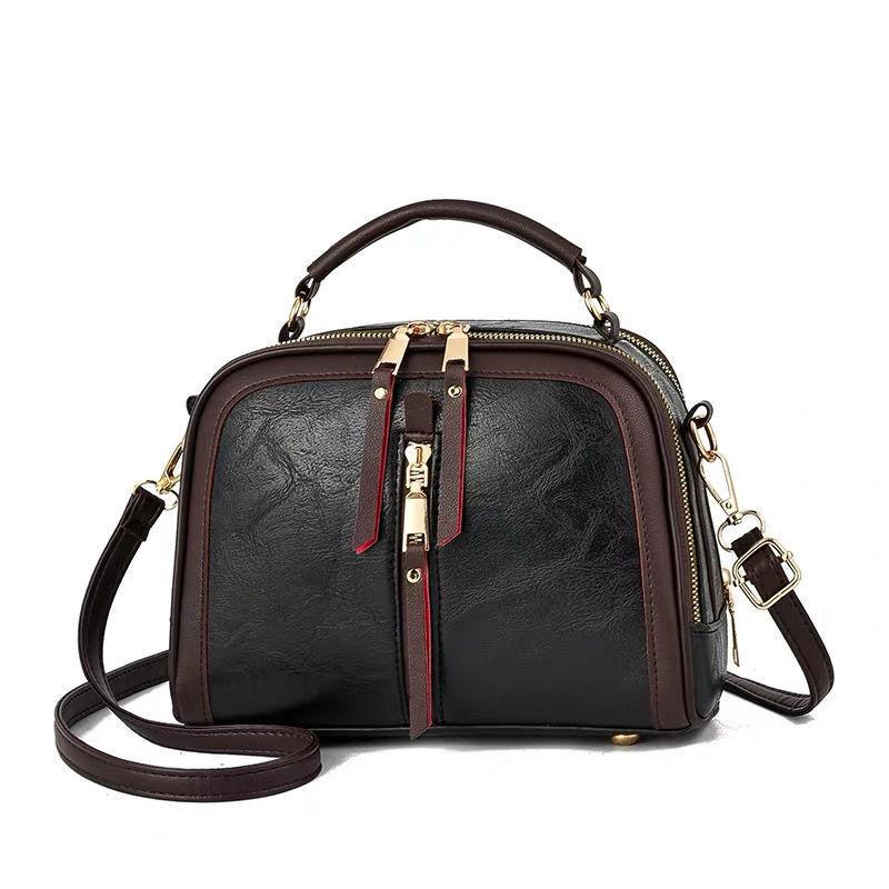 

New fashion retro messenger handbag popular coffee contrasting color shoulder women s bag contrasting color cute small round bag чорний