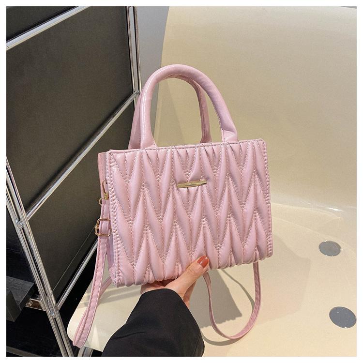 

2024 spring and summer new simple retro pleated handbag bag women s European and Korean texture large capacity messenger women s bag рожевий