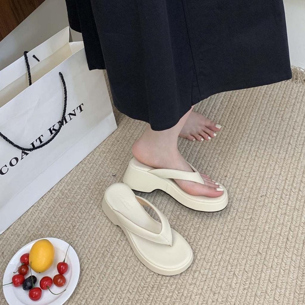 2025 summer new thick-bottomed slope heel pinch foot flip-flops Internet celebrity super fire not tired feet cool slippers women
