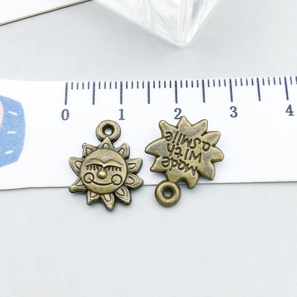 100-Piece Five-Color Alloy Sun, Moon, and Star Pendant Charms for DIY Jewelry