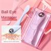 A double-ended manual eye massage roller with a gentle roll-on design for delicate eye treatments