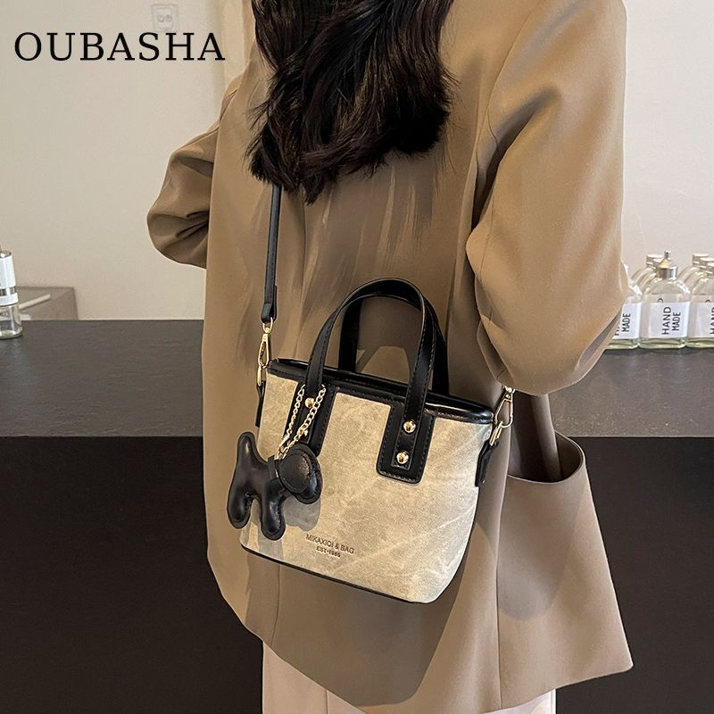 

Fancy Best Selling Bag Women s 2025 New Arrival Summer Best Selling Handbag Special Interest Light Luxury Cross Body Bucket Bag Rice spell black belt pendant [main picture]]