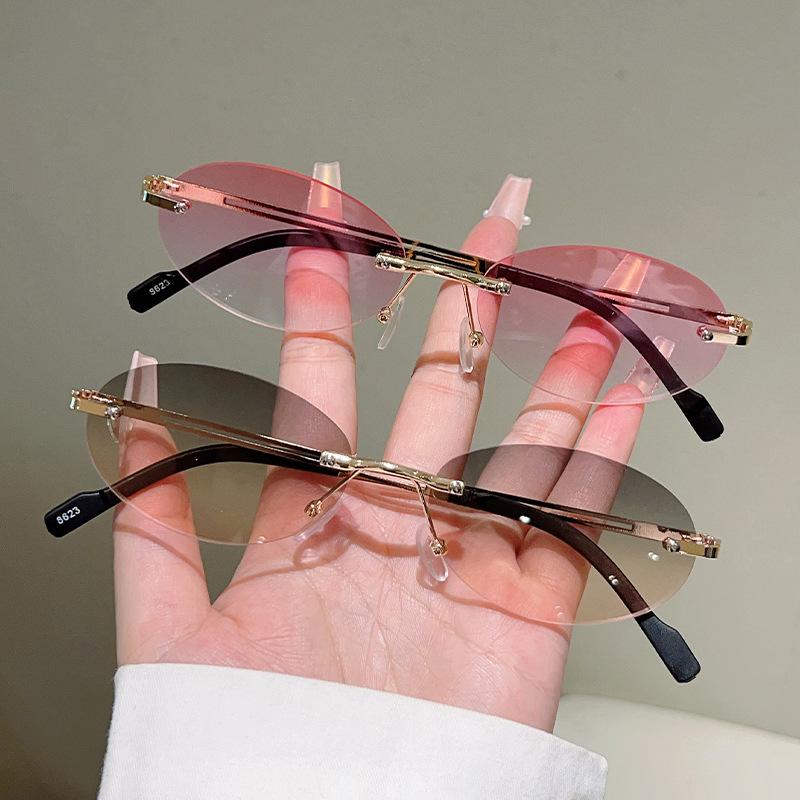 Frameless Oval Sunglasses Metal Thin Temples with Ocean-Inspired Lenses Retro Brand Designer Sunglasses UV400 Shades Eyewear