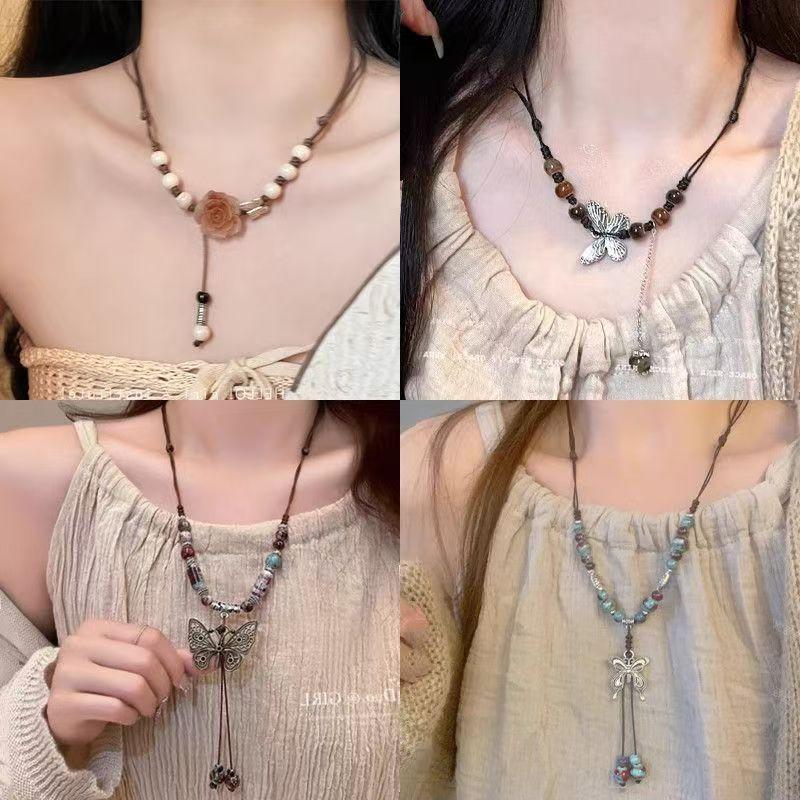 New Chinese ethnic style butterfly necklace niche ancient style high-end long woven sweater chain Maillard collarbone chain