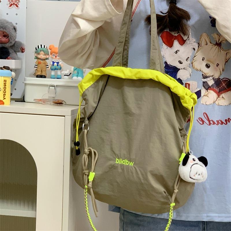 Niche Canvas Bag Color Matching Drawstring Adjustable Shoulder Strap Multi-function Hand Carry Contrasting Color Light Crossbody Shoulder Bag