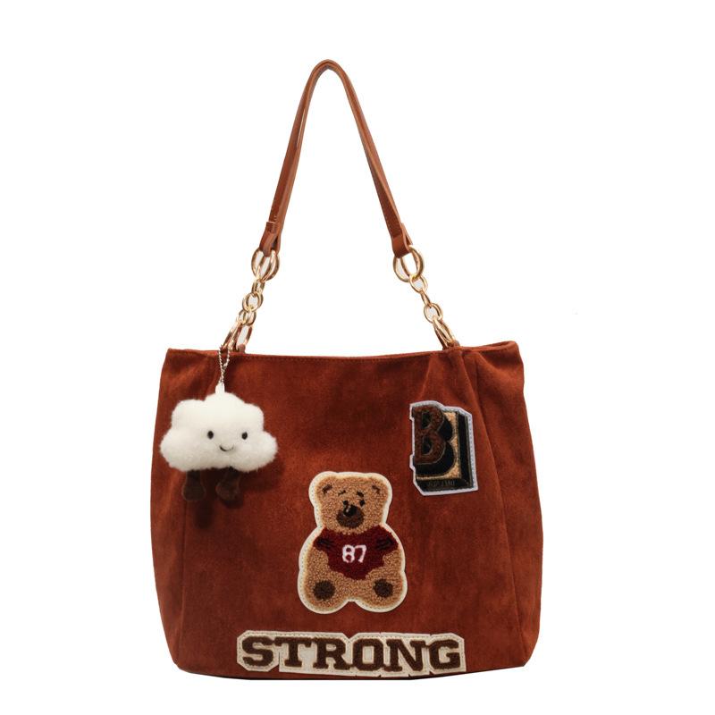 

Bear large-capacity bag 2025 autumn and winter new women s bag trendy retro tote bag alphabet shoulder commuter bag single package коричневий