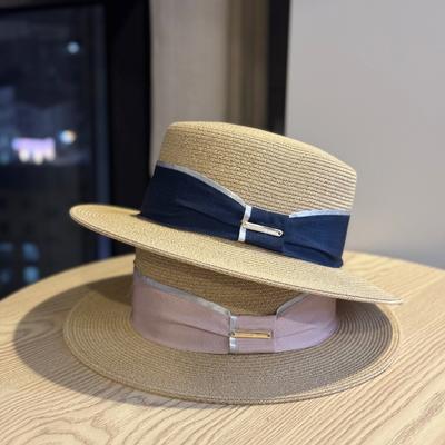 Spring and Summer French Retro Flat-top Straw Hat for Women, Woven Sun Hat with Wide Brim, Ribbon, and Metal Logo, Suitable for Seaside Vacations and