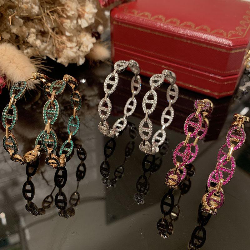 Ovale Schweinenasen-Ohrringe mit Super-Flash-Mikro-Pavé für ein schlankeres rundes Gesicht - Internet-Promi-Stil