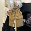 Schultasche Damen-Tasche 1011 Frühjahr neu Japanisch und Koreanisch Zugband Rucksack einfarbig leicht große Kapazität Pendler Nylon-Rucksack