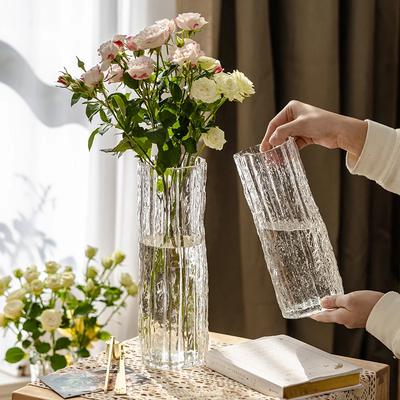 Vase ornement salon arrangement floral verre transparent lumière luxe haut de gamme sensation eau nourriture lys rose hydropo