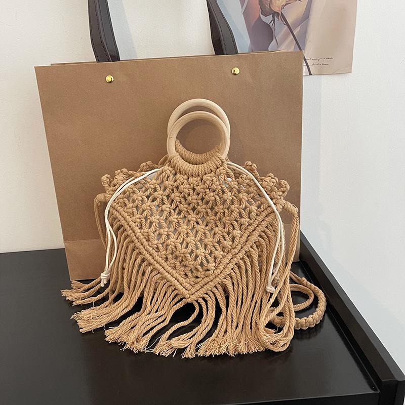 

Bohemian fringed portable small bag women s 2025 new spring and summer hollow shoulder woven bag crossbody straw bag хаки