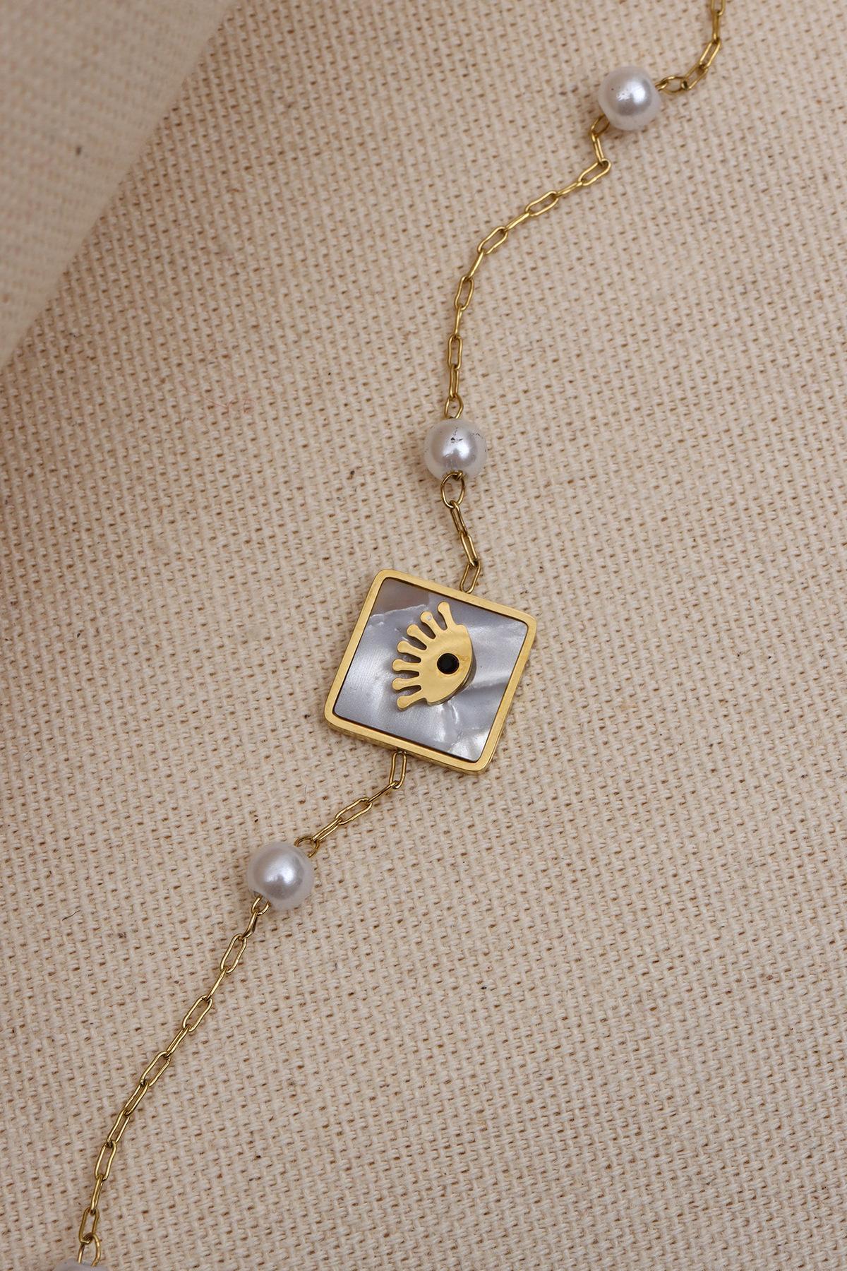 

Браслет «Стальной глаз» с цепочкой из жемчуга