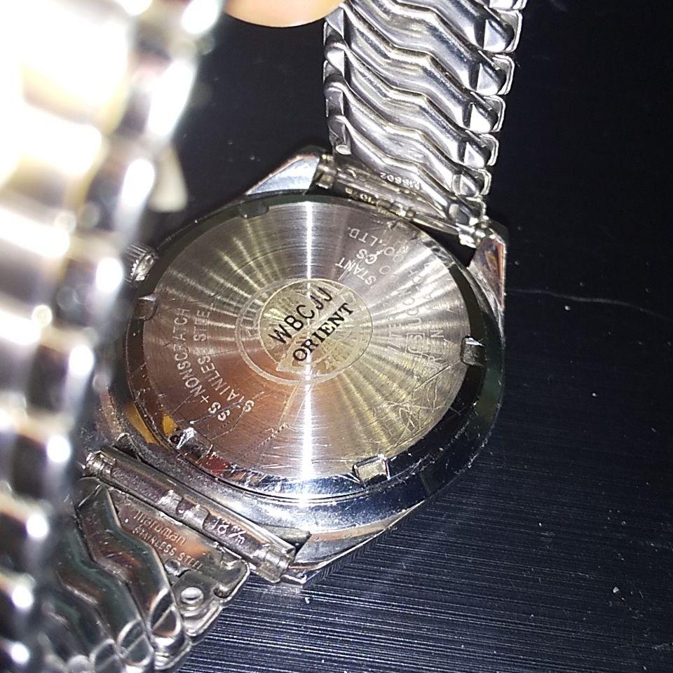 Used ORIENT QUARTZ SWIMMER 10BAR watch silver day date 00s y2k operation