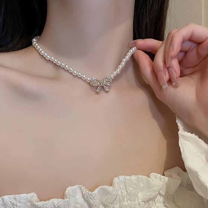 Nk-196 Diamond-Encrusted White K Bow Pearl Necklace Short High-End Niche Light Luxury Women'S New Internet Celebrity Explosion
