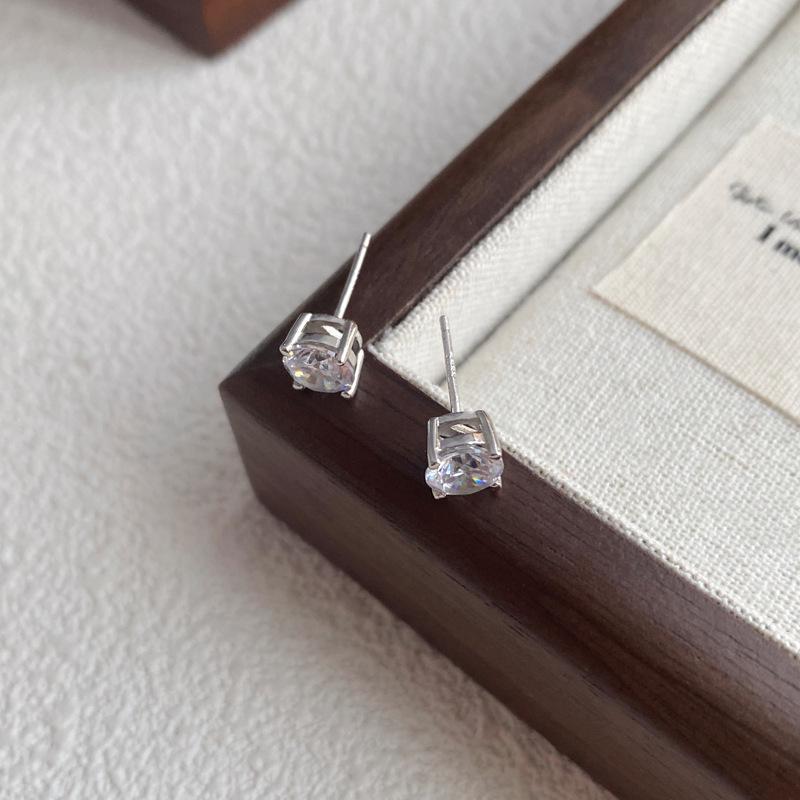 S999 Sterling Silver Four-Prong Zircon Stud Earrings - Luxurious High-Shine Piercing Jewelry