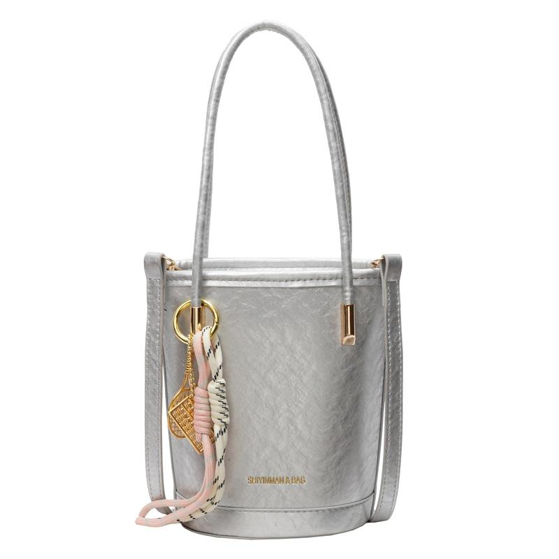 Wholesale popular niche design casual simple hand carrying bucket bag fashionable high-grade texture versatile messenger bag bag women