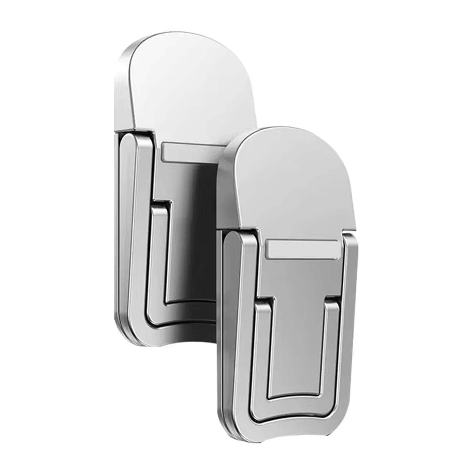 

Невидимая подставка для ноутбука с двумя слотами, регулируемой высотой и углом наклона для комфортного просмотра. Подходит для ноутбуков разных размеров. серебряный