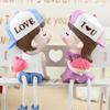 "Kissing Couple Resin Figurines: Cute Hanging Feet Decorative Ornaments for Living Room or Bedroom"