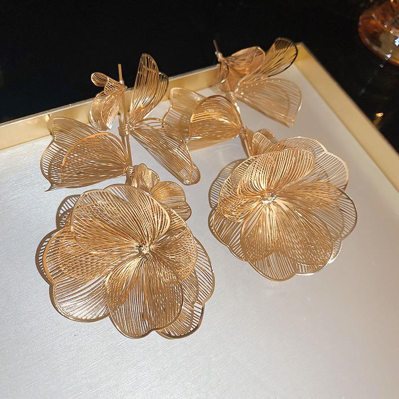 Silver needle hollow metal flower fringed earrings exaggerated long earrings niche high-end design earrings