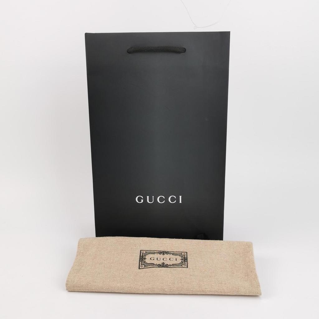 [Pre-Owned] Chinese New Year Collection Letter Print Zipper Leather Clutch - Unused #UXFZG6