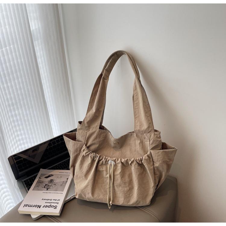 

Drawstring casual tote bag women s new trendy versatile underarm bag large capacity storage bag commuter canvas shoulder bag хаки