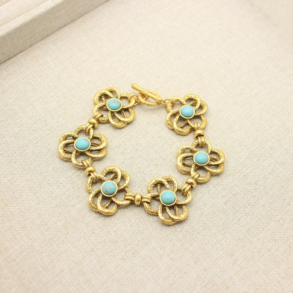 

Комплект из ожерелья-лепестка четырехлистного клевера и бирюзового браслета для женщин - Аксессуары Осень/Зима