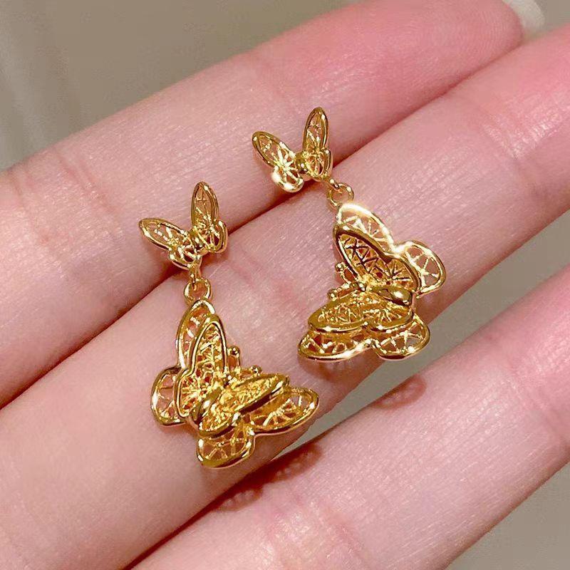 Golden filigree woven butterfly stud earrings with cold temperament earrings accessories