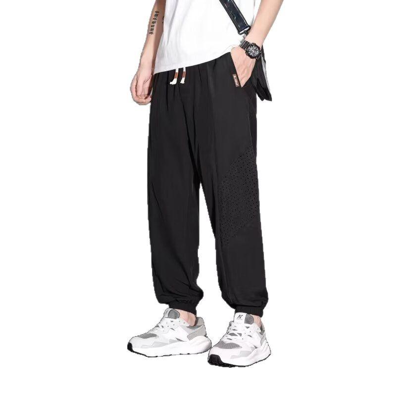 Pánské ležérní kalhoty letní tenké volné velké velikosti 2025 tepláky trendy rychleschnoucí sportovní devítibodové kalhoty ultratenké