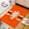 Orange Lion Crest with Stripes Patterned carpet, suitable as a non slip play mat for the living room and bedroom sofa