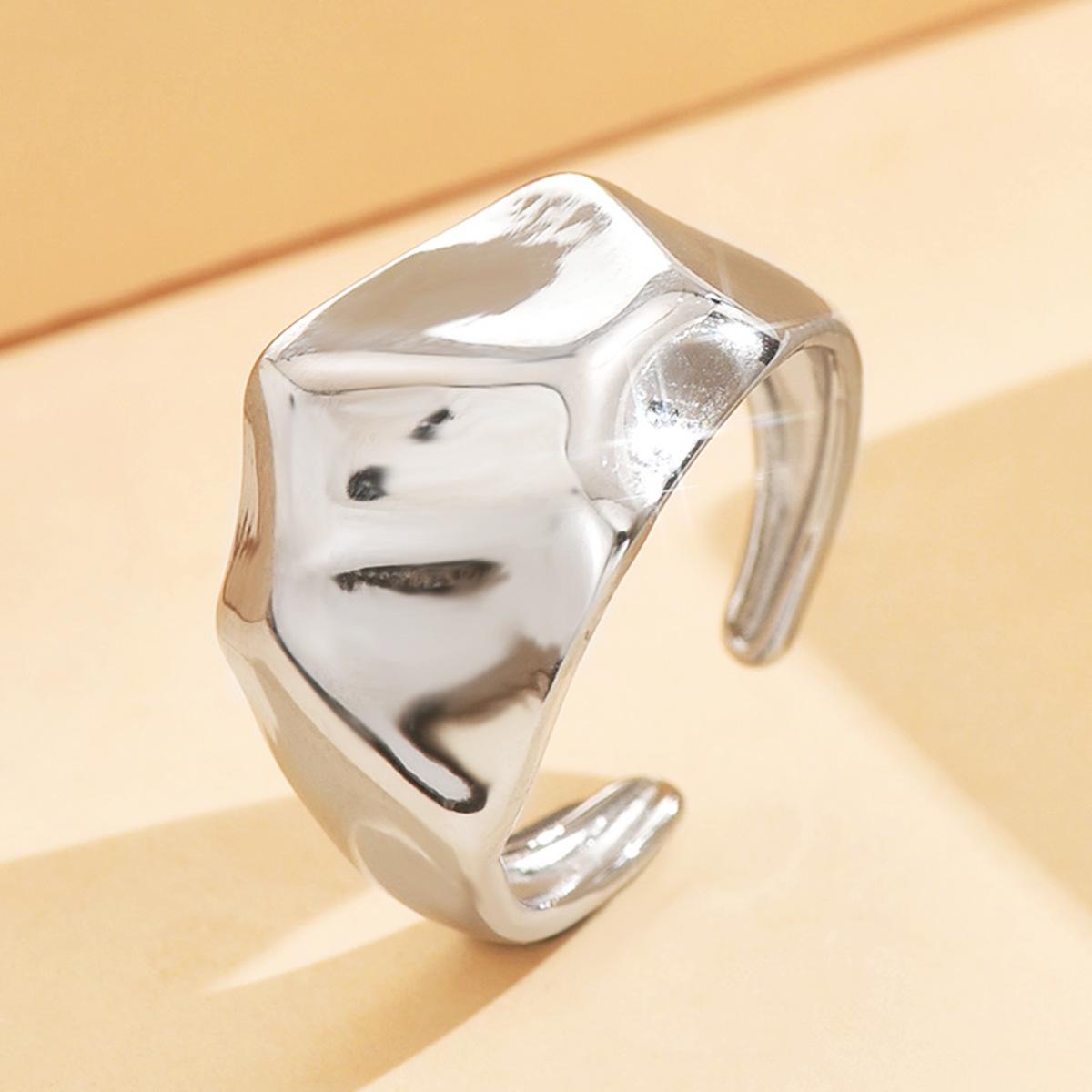 Retro Irregular Stainless Steel Ring with Heavy Metal Vibe, Oil Pressed Gold Finish