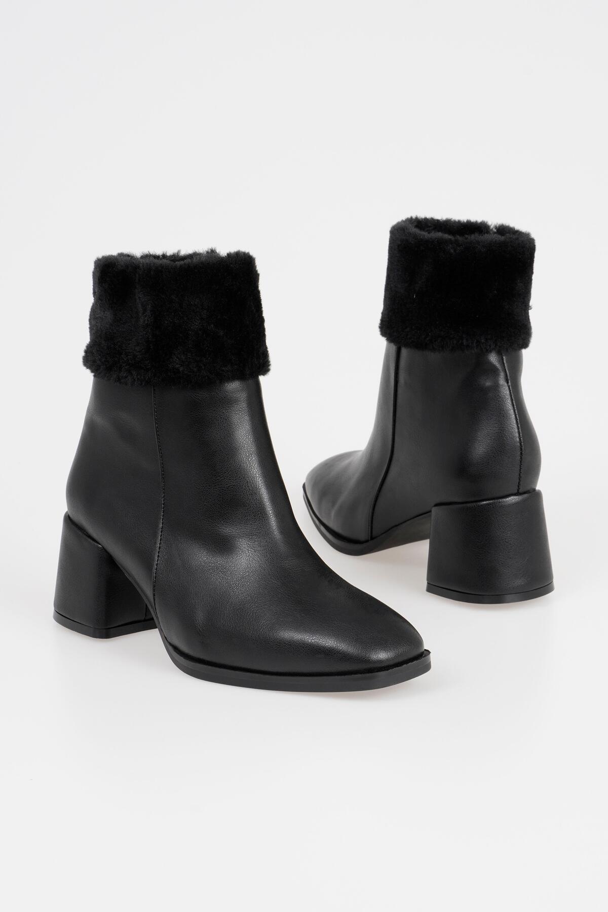 

Женские зимние туфли на каблуке с мехом и молнией на каблуке