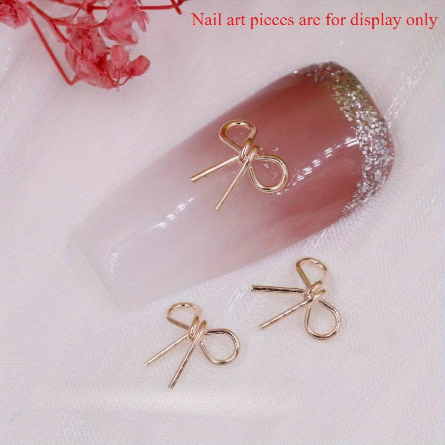 50Pcs Exquisite Sweet Nail Bow Wrapped Retro Simple Three-dimensional Alloy Nail Jewelry Rivets Hand-worn Nail Top Decoration