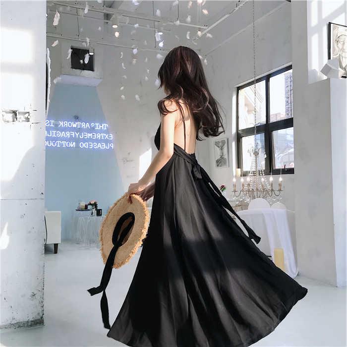 Lös sommarklänning i maxilängd i japansk stil - Fransk mode design med öppen rygg