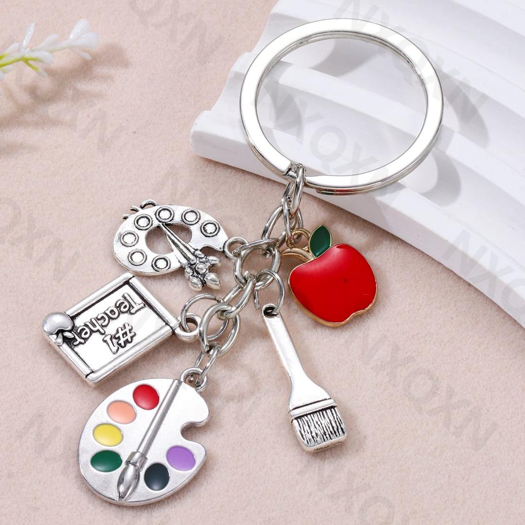 

Classic Drawing Board Ruler Crayon Pencil Enamel Keychain Apple Brush Pendants For Women Men Good Teacher Gift Handmade Jewelry
