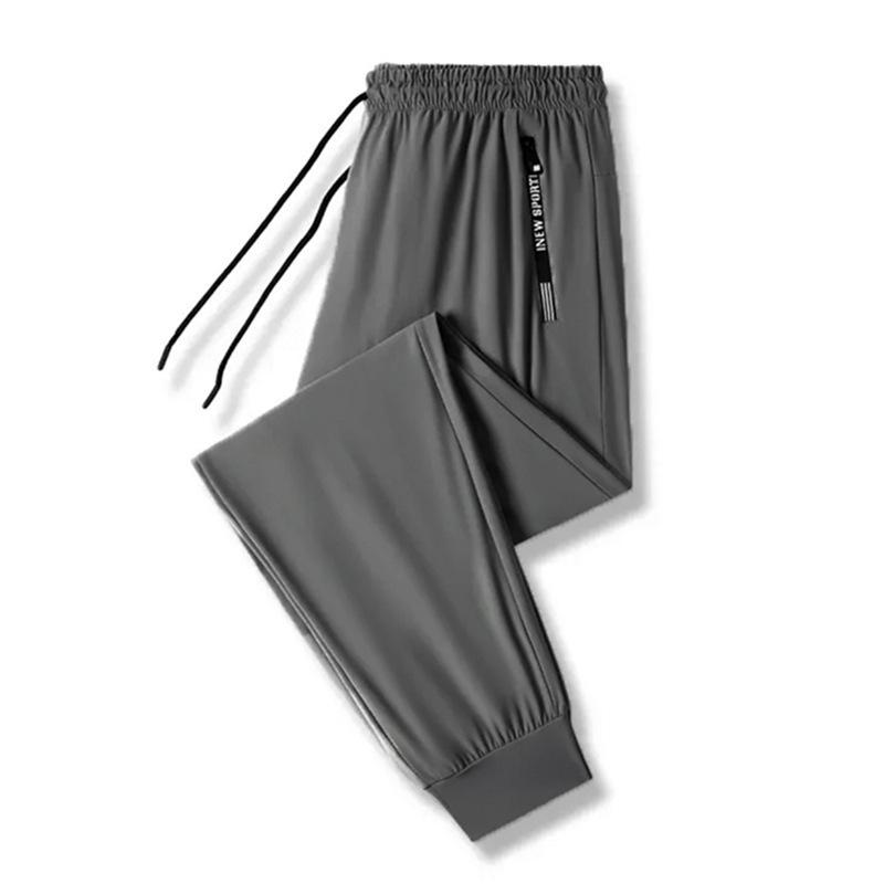 Men's Summer Ice Silk Jogger Pants - Casual, Loose, Versatile, Air Conditioning, Sports Pants with a Straight Leg Design.