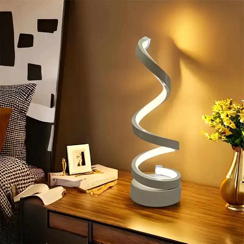 A modern, elegant white spiral desktop lamp, powered by USB with three-color dimming, suitable for various types of rooms.