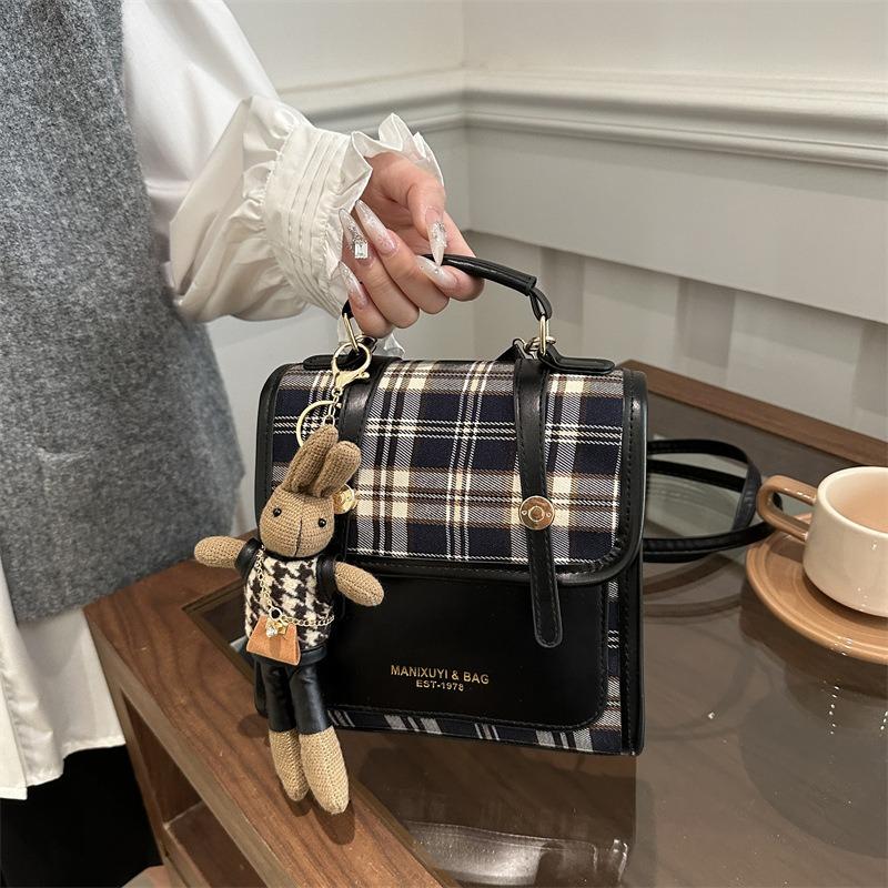 Trendy plaid fashion retro versatile student college style backpack women's leisure personality new early spring backpack