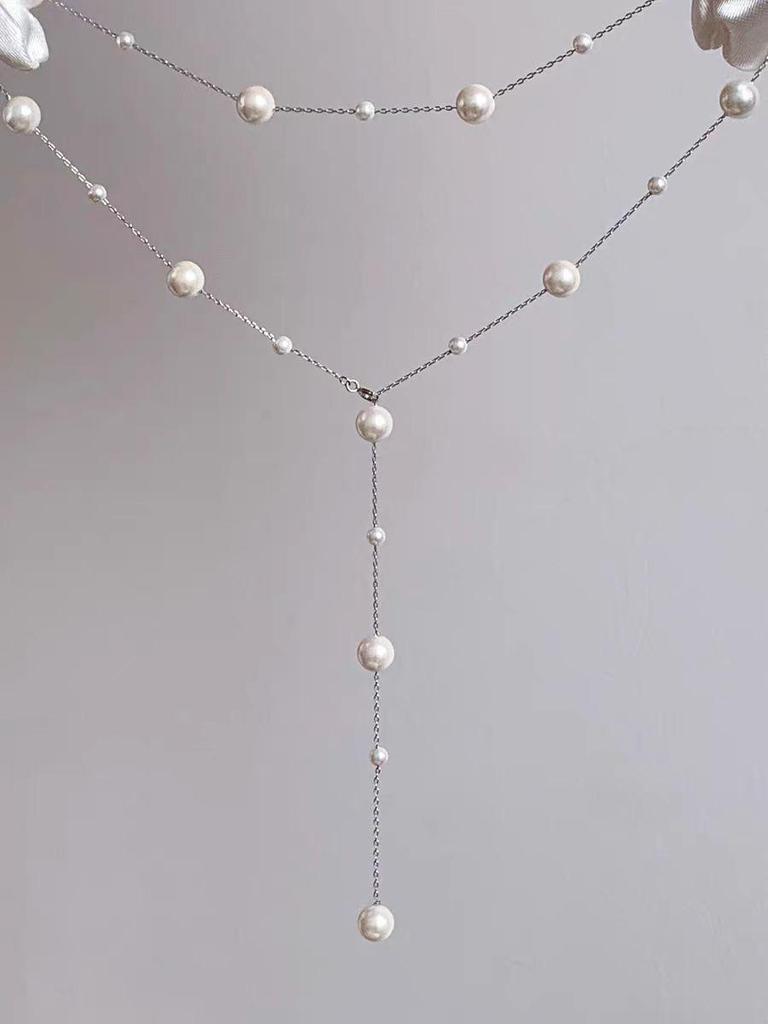 Elegant Multi-Wear Pearl Necklace for Women - Light Luxury, Niche Design, High-End, Fresh, Sweet, Simple, and Fashionable