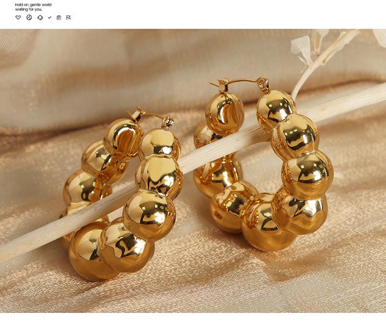 Textured Gold-Plated Titanium Steel U-Shaped Earrings with Steel Ball Design