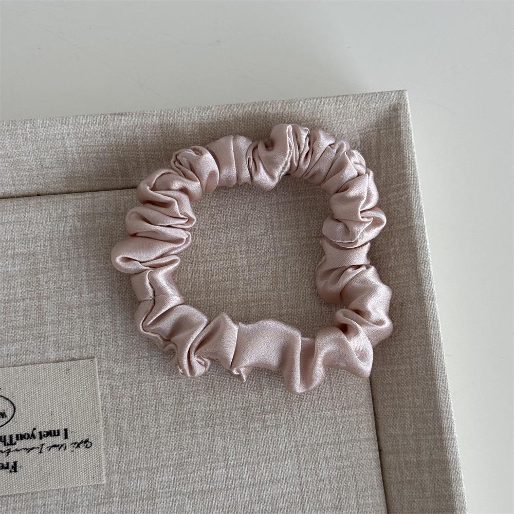 

Silk Elastic Hair Tie for Women - Non-Damaging, Seamless, High-End Feel, Perfect for Simple Buns. светло-розовый