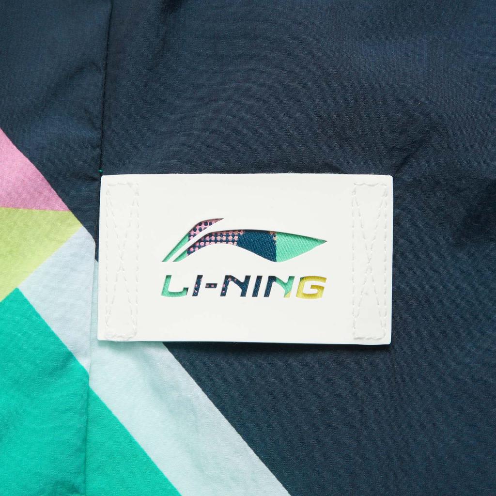 Li Ning 2024 Honor Color Block Spodnie Jogger Unisex ze Średnim Stanem Wygodne Oddychające Wszechstronne Spodnie Granatowo-Miedziano-Zielone z Pełnym Nadrukiem AYKU937-2