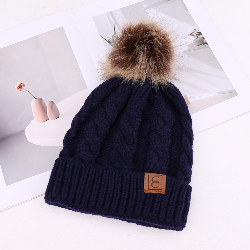 European and American fashion solid color simple warm comfortable knitted hat hairball decoration windproof face small wool hat