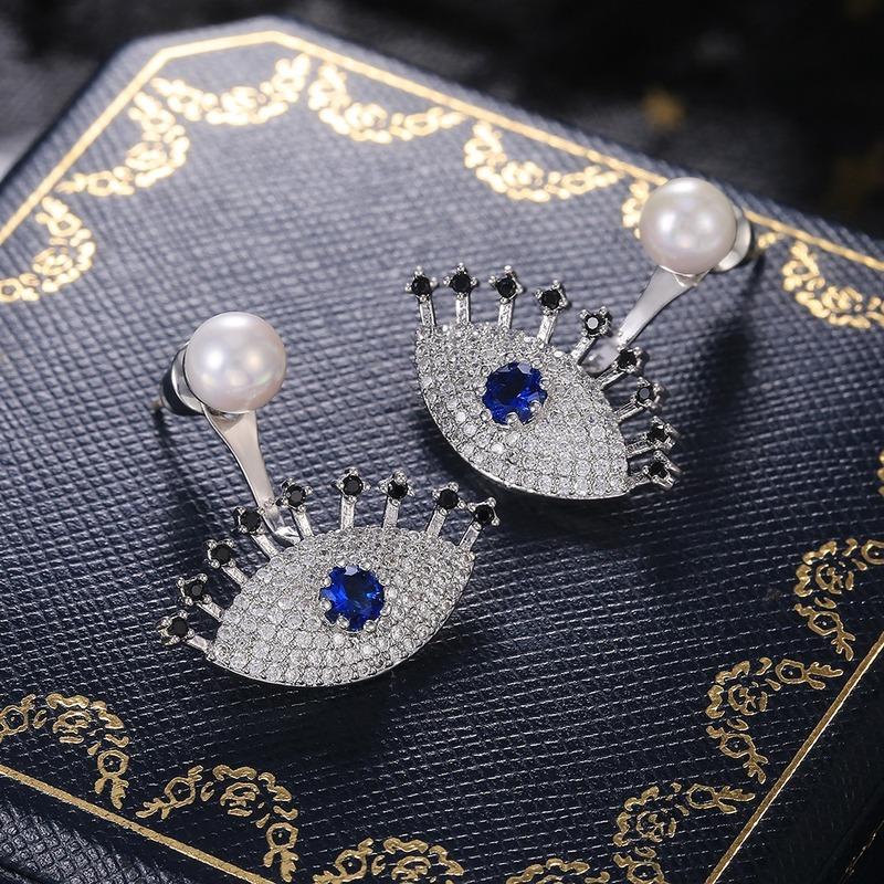 CAOSHI Orecchini Trendy a Forma di Occhio con Perla Sintetica e Zirconia Cubica Piena Scintillante Gioielli Creativi e di Personalità per Feste