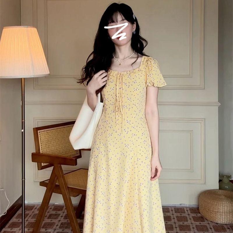 French temperament bubble sleeve yellow floral dress children's summer new small super good-looking long dress