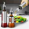 Stainless Steel Oil Bottle with Volume Control & Automatic Opening/Closing - Leak-Proof Glass Oil Pot for Home Kitchen, BBQ, Hotel Seasoning.