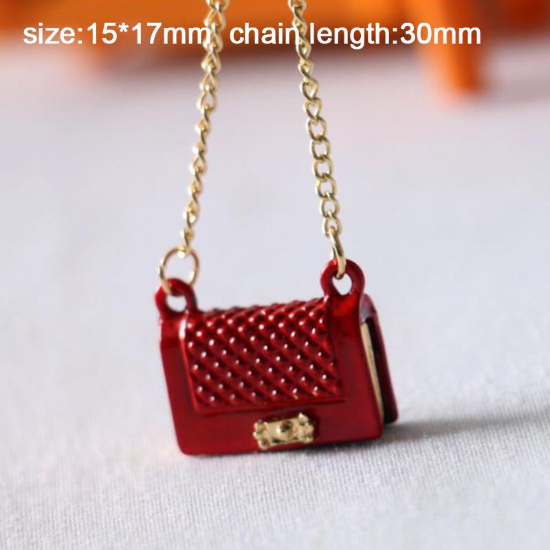 

Кукольный домик Мини Металлическая сумка Аксессуары Украшения Миниатюры Сценические украшения 15*17mm красный