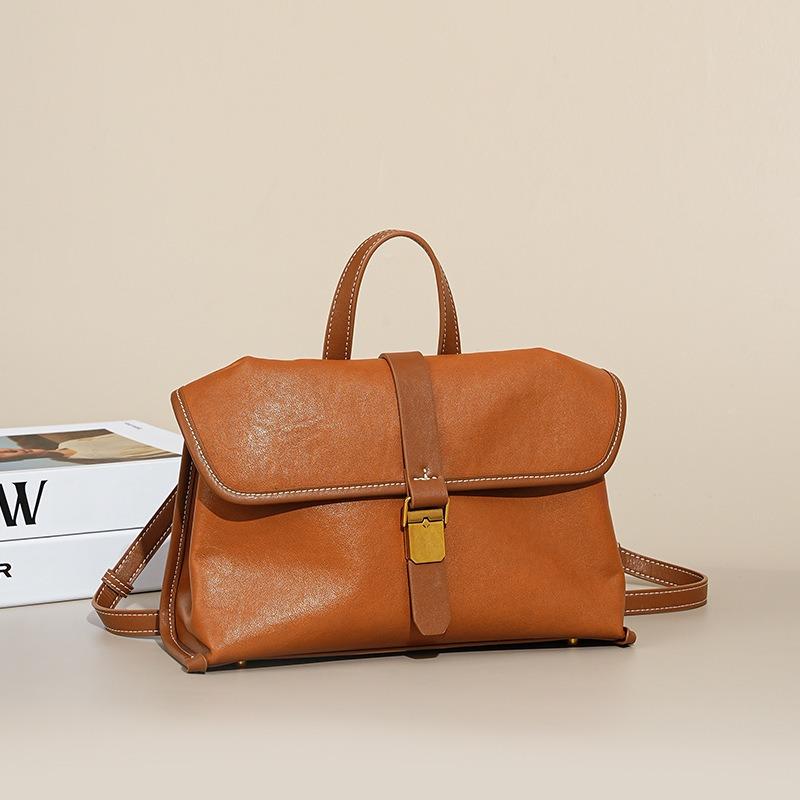 New Vegetable Tanned First Layer Cowhide Commuter Niche Design Travel Messenger Bag Women's Small Satchel Shoulder Messenger Bag